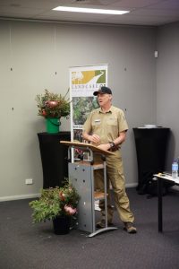 Rick Dawson standing at a lectern