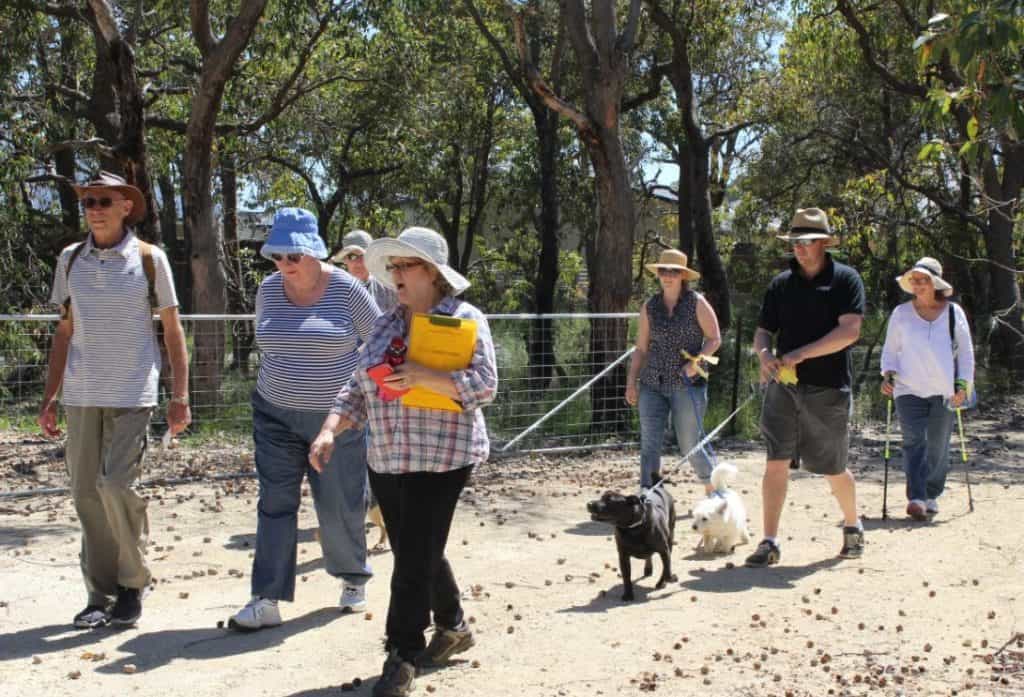 people walking in Brickwood that has just been given funds from the Peel Harvey Catchment Council Community Grants to help protect and enhance.