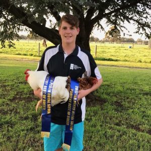 Reece Jerret holding award winning chicken